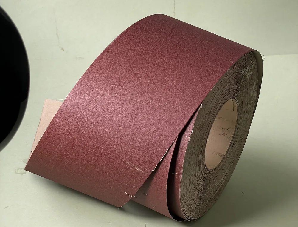 L-555 aluminium oxide paper-backed sanding roll
