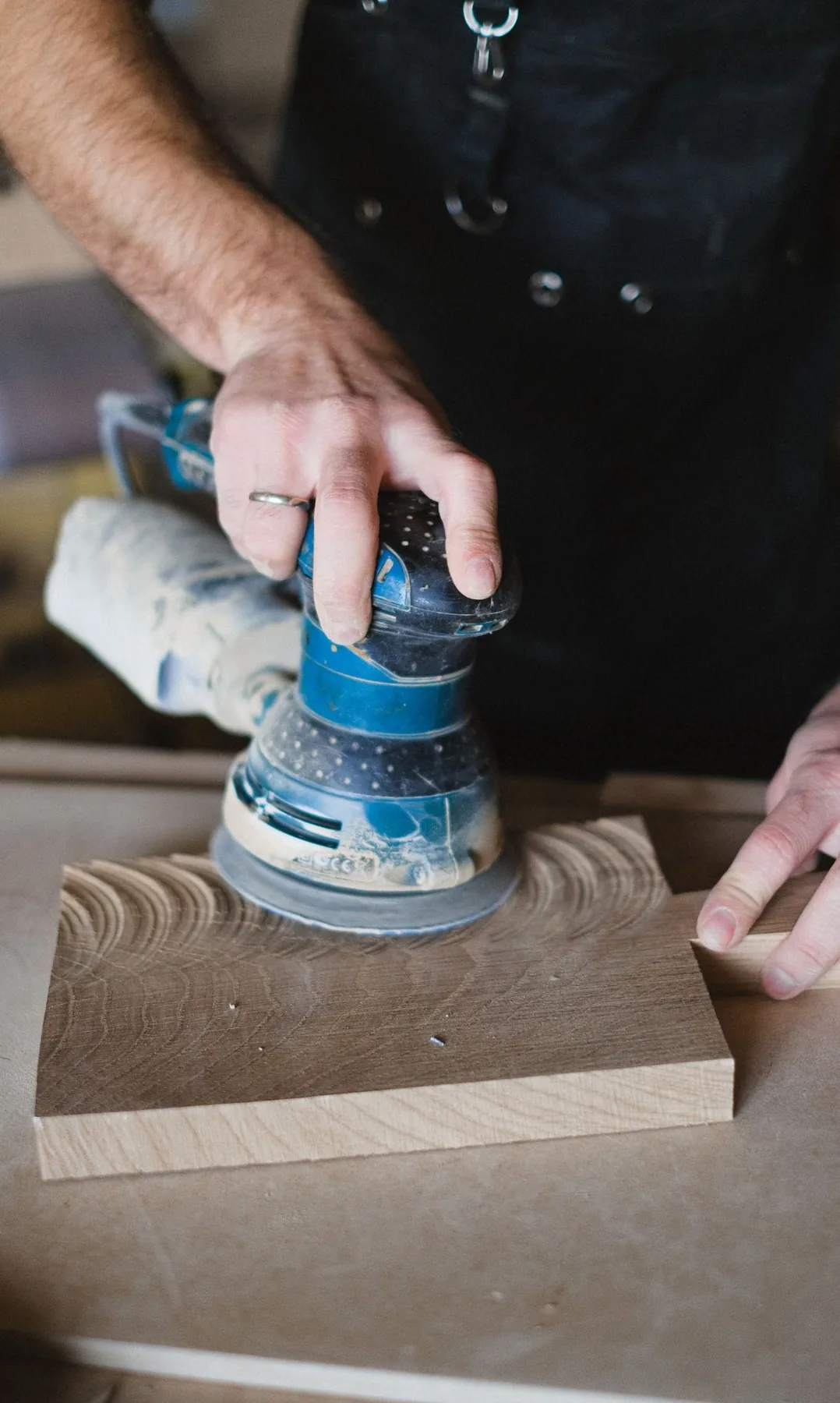 Orbital sanding on a timber workpiece